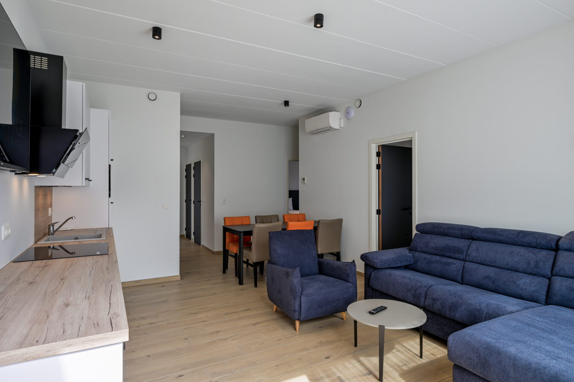 Living de l'appart hotel de 80m² de l'Orange Hotel